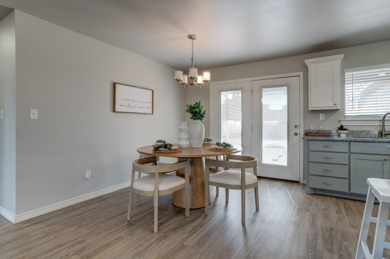 9013 County Road 6100 Shallowater, TX 79363 - Photo 27 of 49 a view of a dining room with furniture window and wooden floor