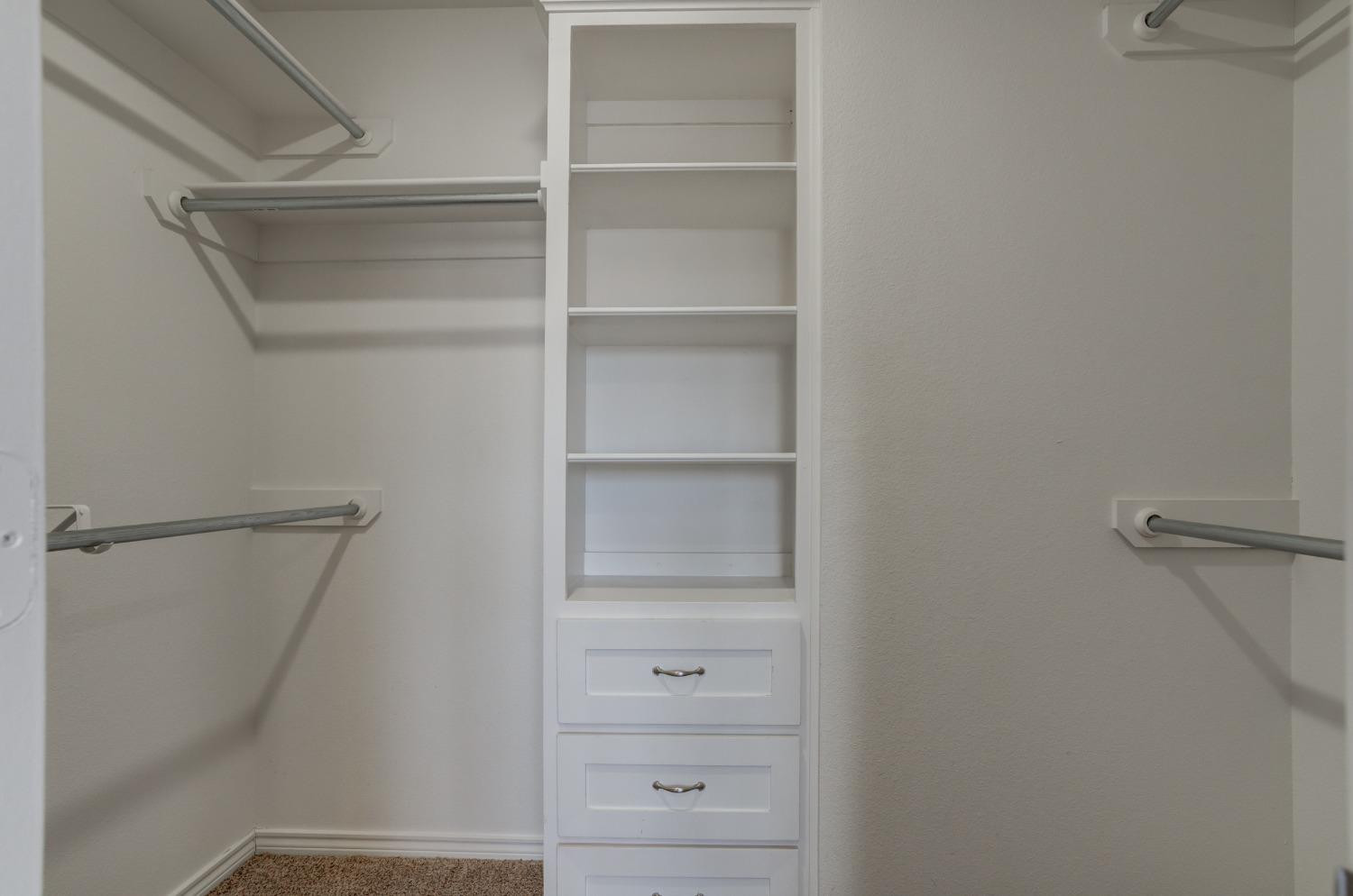 9013 County Road 6100 Shallowater, TX 79363 - Photo 38 of 49 a view of walk in closet