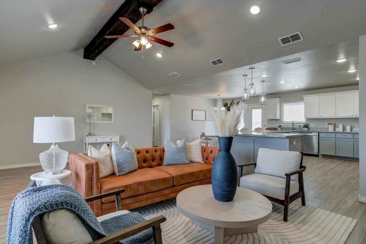 9013 County Road 6100 Shallowater, TX 79363 - Photo 9 of 49 a living room with furniture and a wooden floor