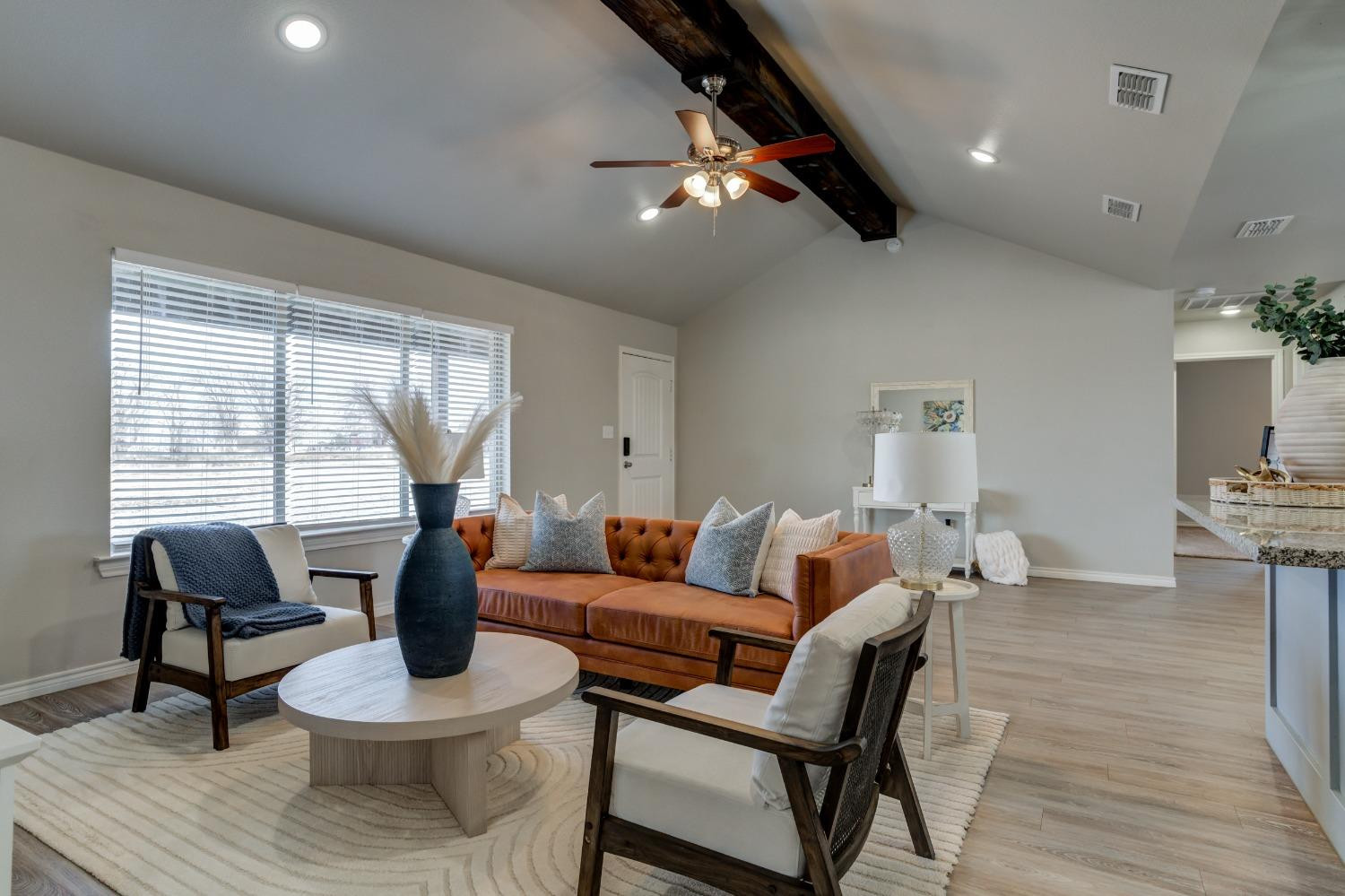 9013 County Road 6100 Shallowater, TX 79363 - Photo 10 of 49 a living room with furniture and a large window
