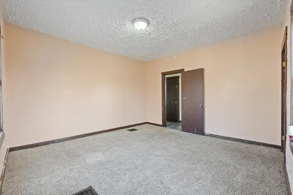 an empty room with an entryway