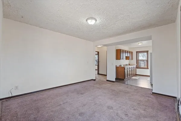 a view of a livingroom with a furniture
