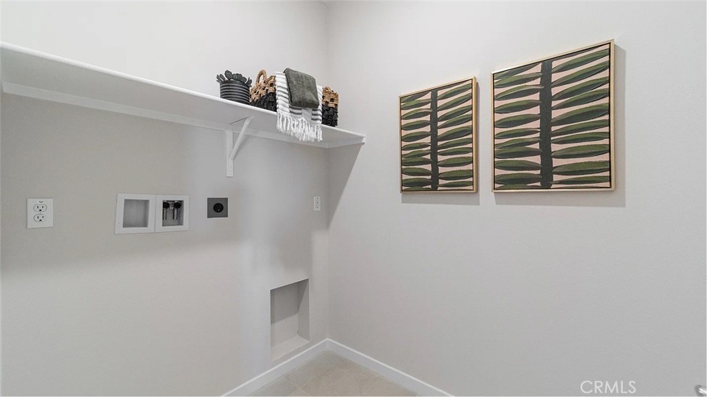 2571 Cloudview Privado Ontario, CA 91761 - Photo 13 of 19 a view of kitchen and utility room