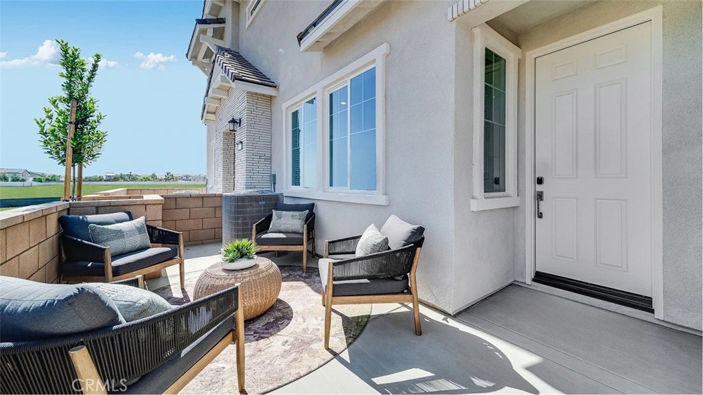 2571 Cloudview Privado Ontario, CA 91761 - Photo 16 of 19 a living room with furniture and a potted plant