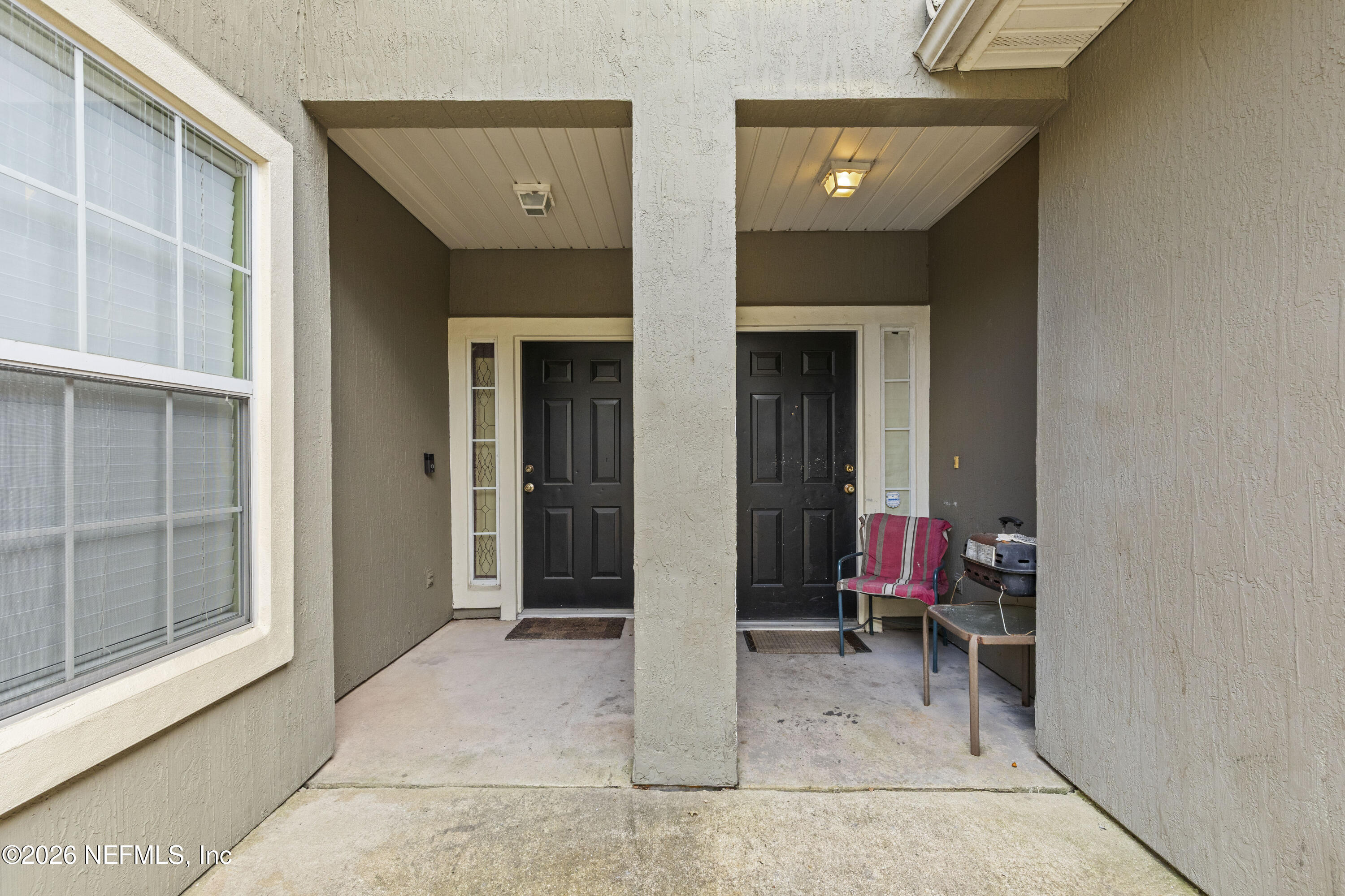 7774 Melvin Road Jacksonville, FL 32210 - Photo 8 of 32 07 Front Door-2