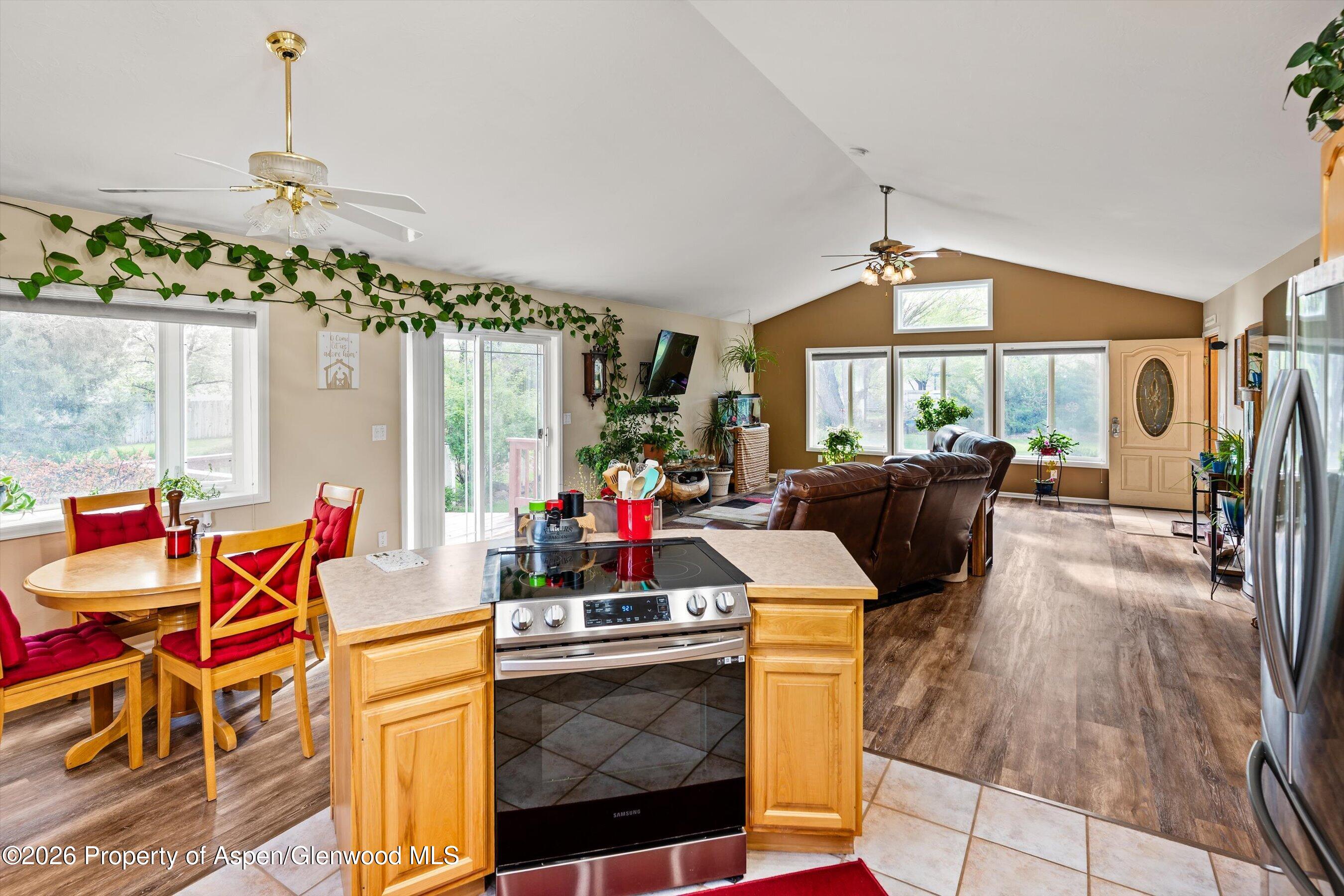 127 Cardinal Way Parachute, CO 81635 - Photo 15 of 41 a very nice looking living room with a large window and dining table