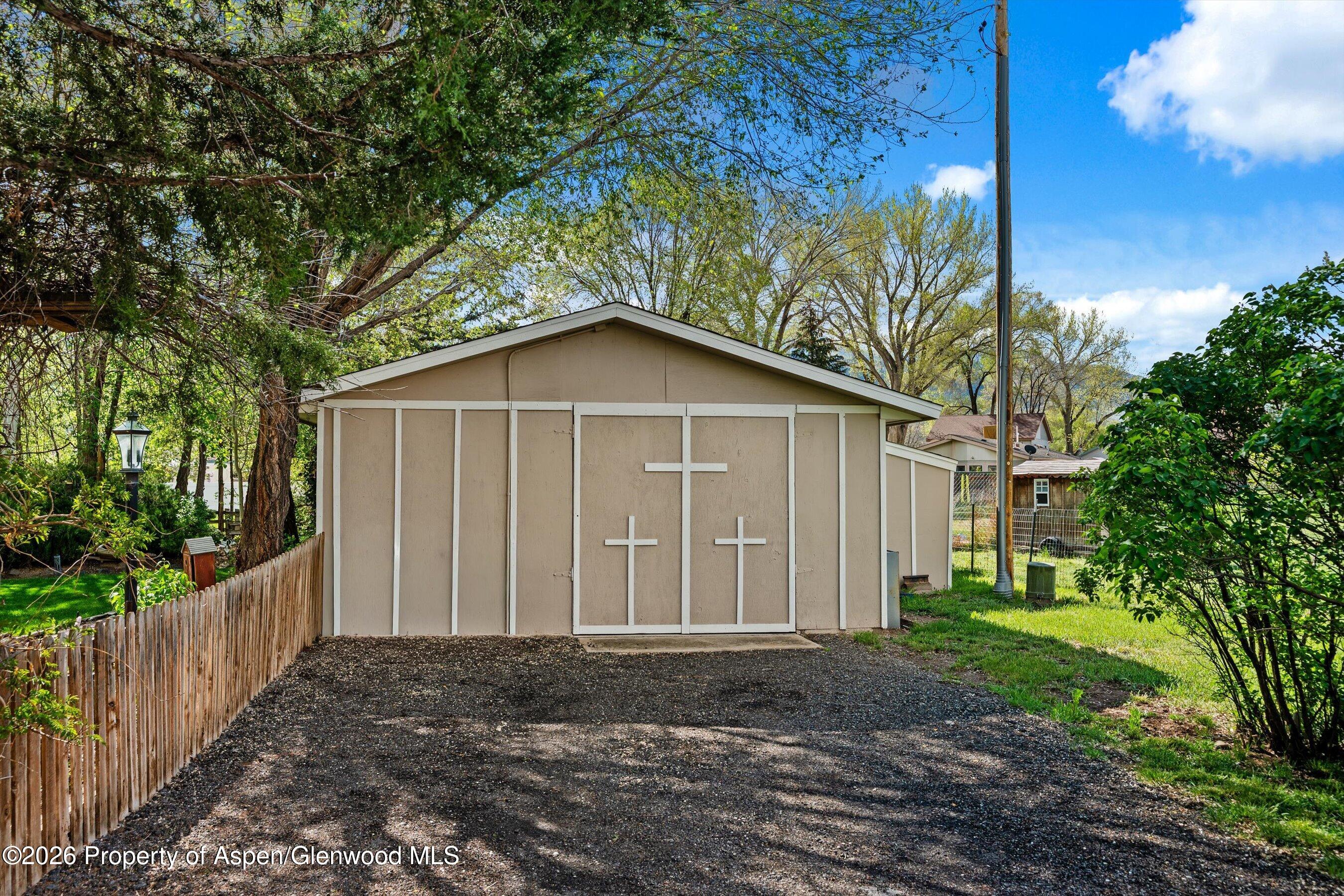127 Cardinal Way Parachute, CO 81635 - Photo 27 of 41 a house with trees in the background