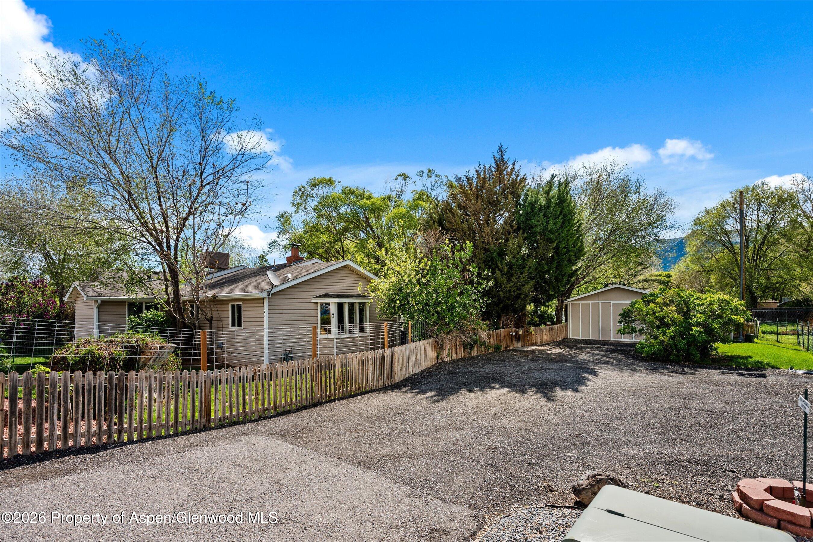 127 Cardinal Way Parachute, CO 81635 - Photo 41 of 41 a view of a house with a yard