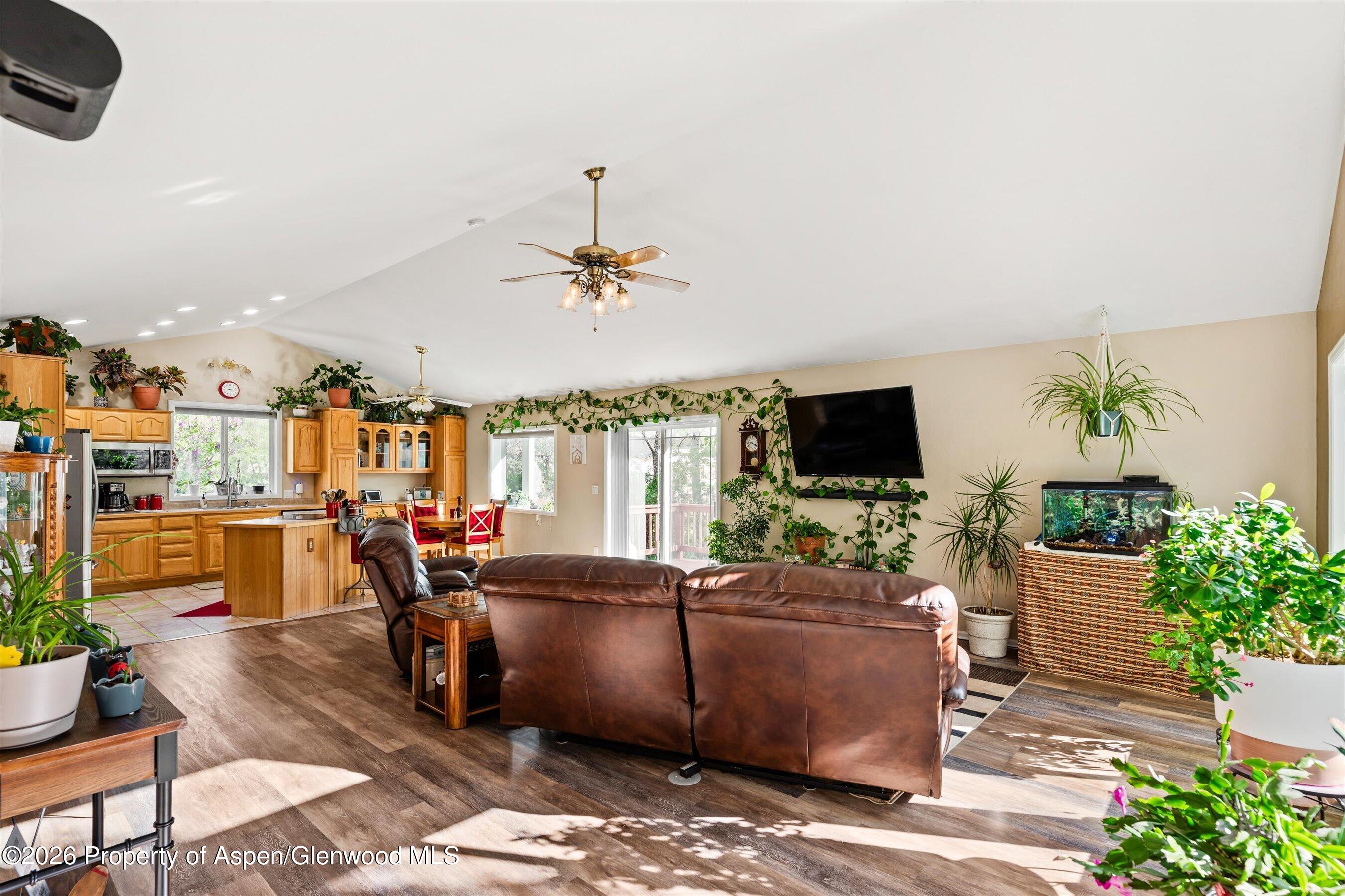 127 Cardinal Way Parachute, CO 81635 - Photo 6 of 41 a living room with furniture and a flat screen tv