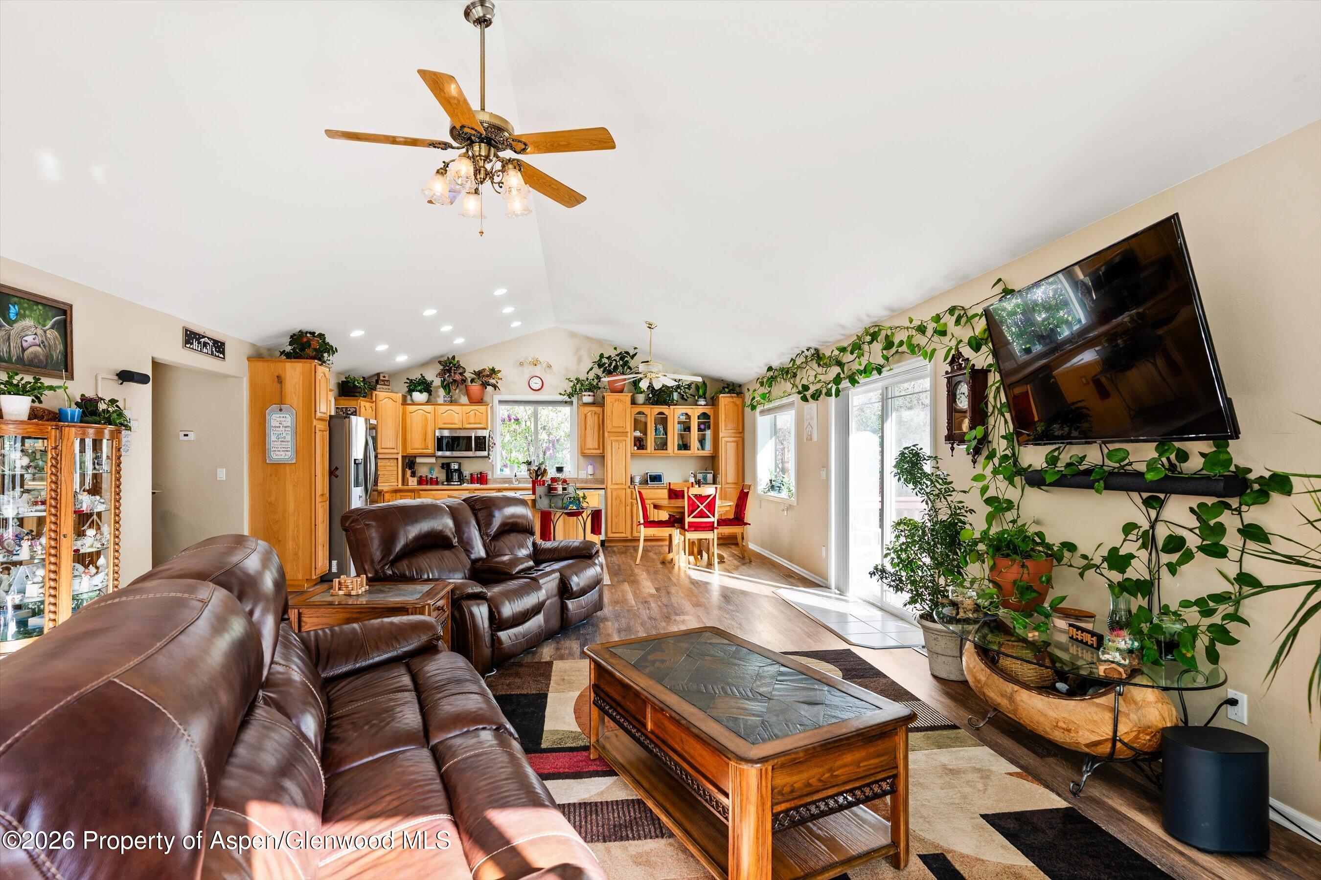 127 Cardinal Way Parachute, CO 81635 - Photo 7 of 41 a living room with furniture and a flat screen tv