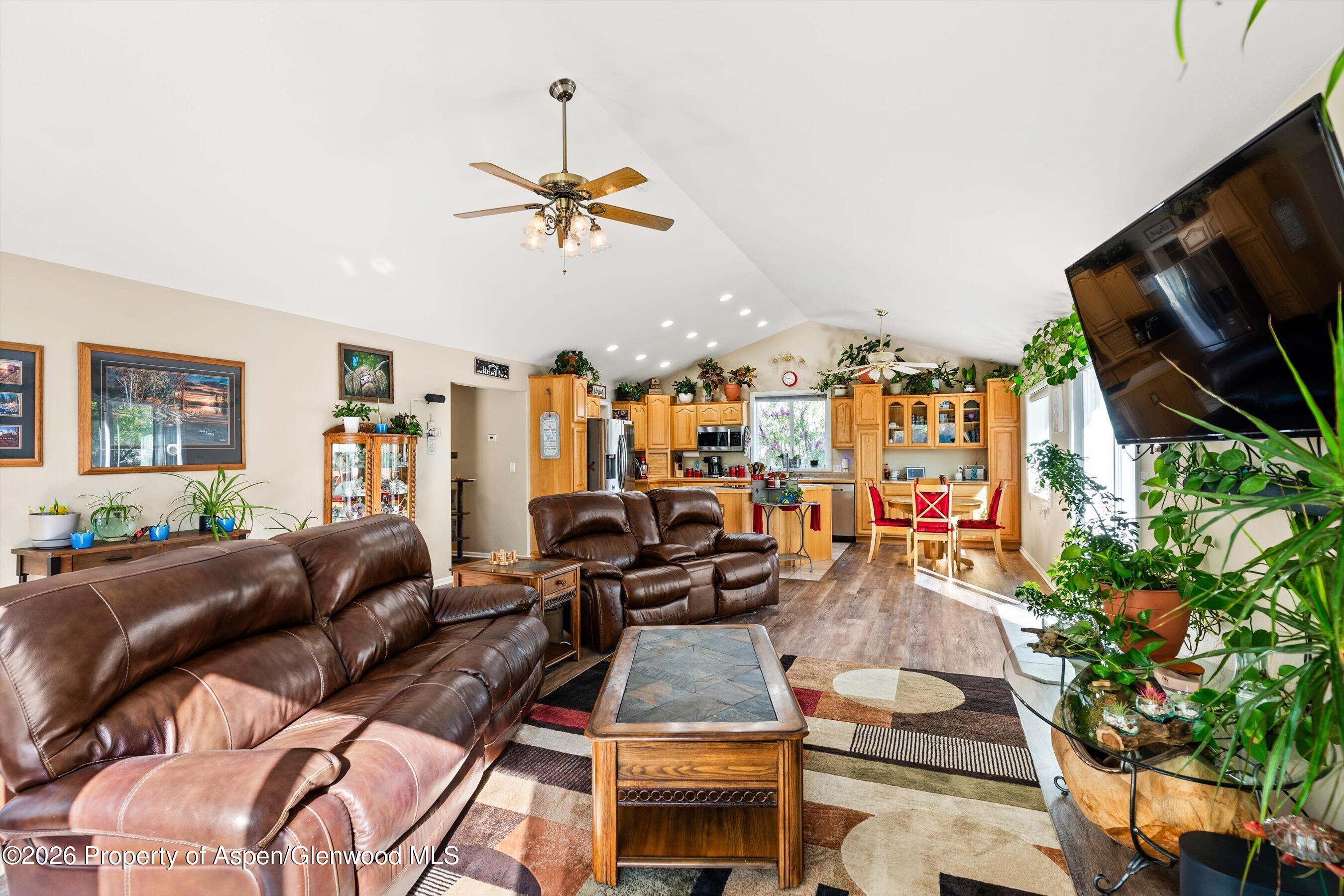 127 Cardinal Way Parachute, CO 81635 - Photo 8 of 41 a living room with furniture and a flat screen tv