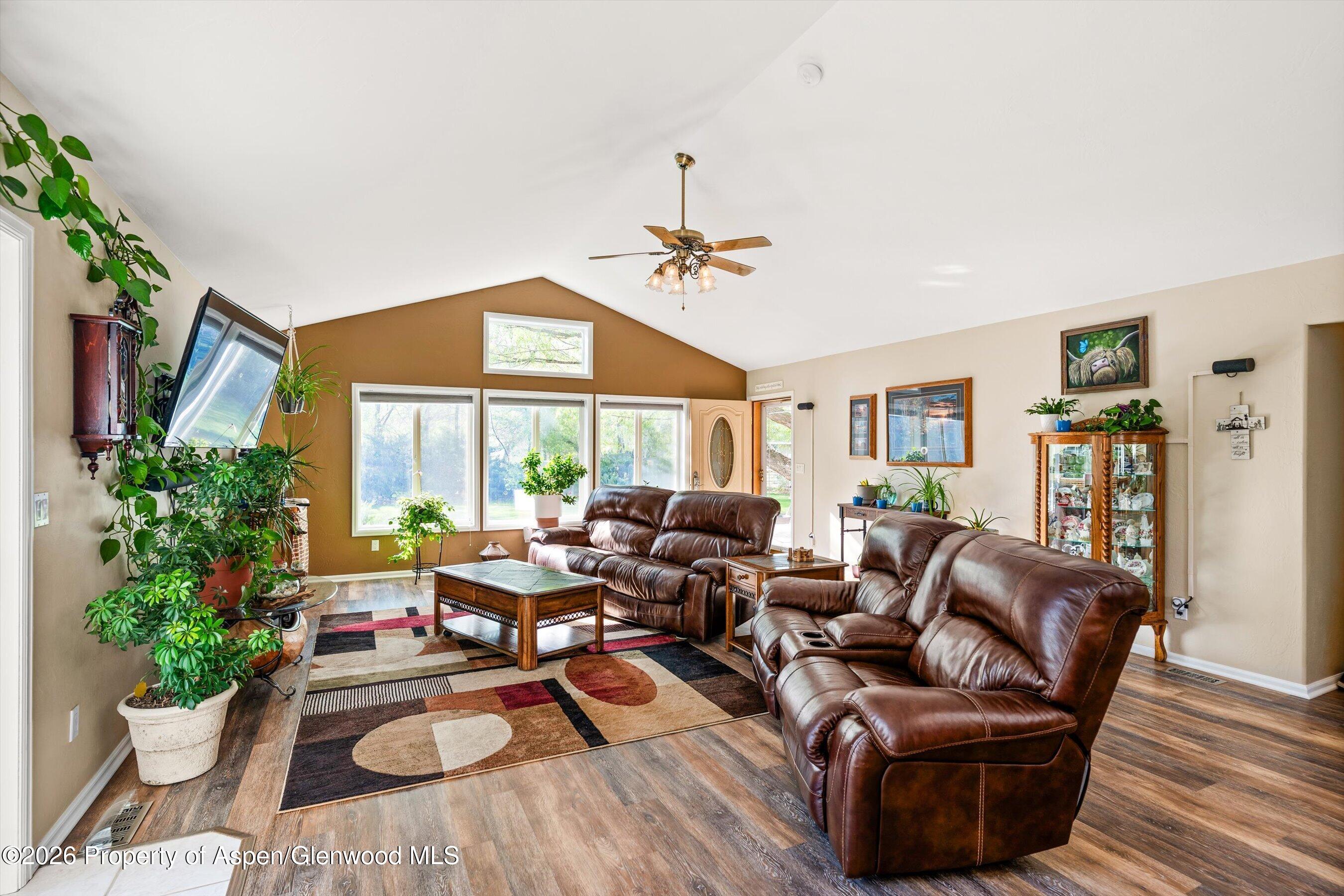 127 Cardinal Way Parachute, CO 81635 - Photo 10 of 41 a living room with furniture and a large window