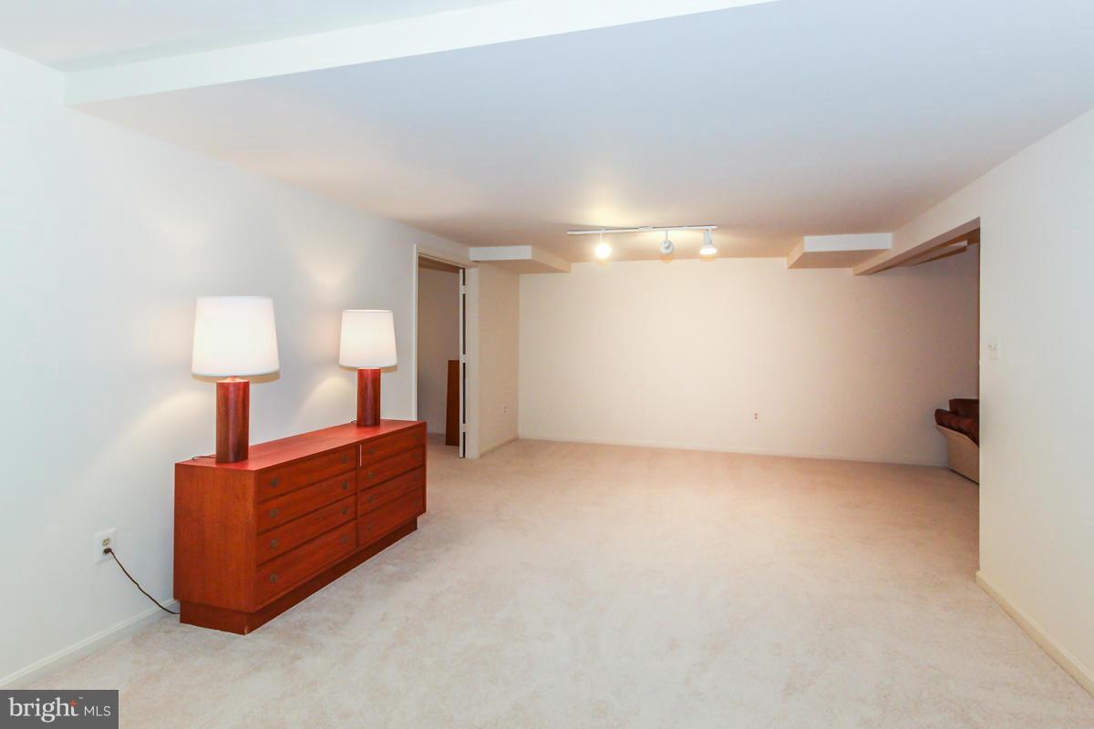 1587 Regatta Lane Reston, VA 20194 - Photo 21 of 30 a view of a room with a sink and a lamp