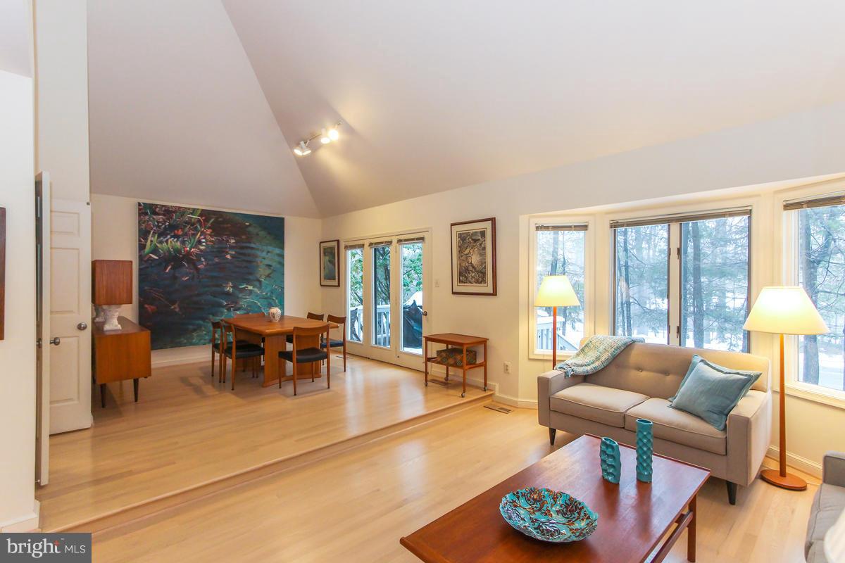 1587 Regatta Lane Reston, VA 20194 - Photo 30 of 30 a living room with furniture and a large window