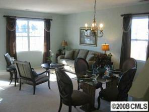 1178 Spicewood Pines Road Fort Mill, SC 29708 - Photo 3 of 8 a view of a dining room with furniture and window