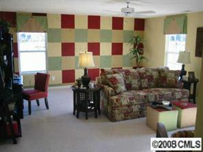 1178 Spicewood Pines Road Fort Mill, SC 29708 - Photo 6 of 8 a living room with furniture and a window