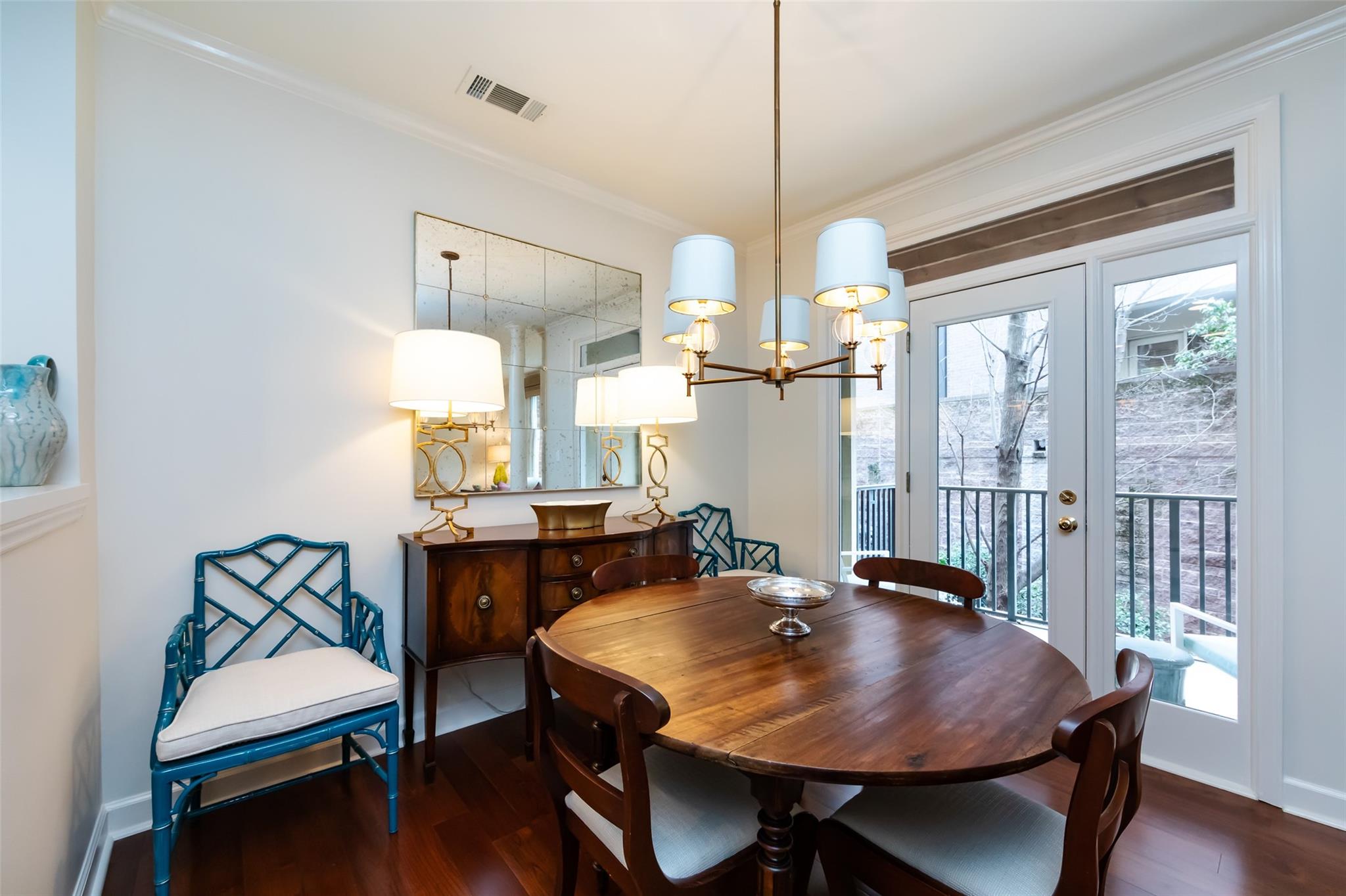416 Queens Road, Unit 6 Charlotte, NC 28207 - Photo 15 of 37 a view of a dining room with furniture window and wooden floor