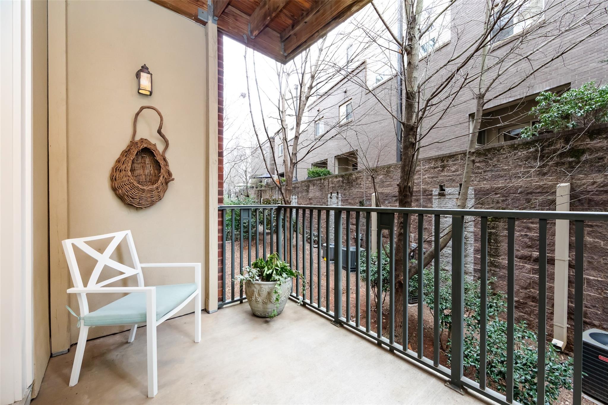 416 Queens Road, Unit 6 Charlotte, NC 28207 - Photo 17 of 37 a view of a chairs and tables in the balcony