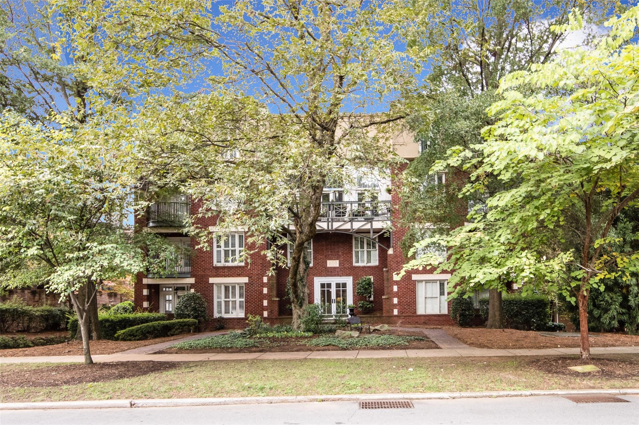 416 Queens Road, Unit 6 Charlotte, NC 28207 - Photo 2 of 37 a view of a building with a street