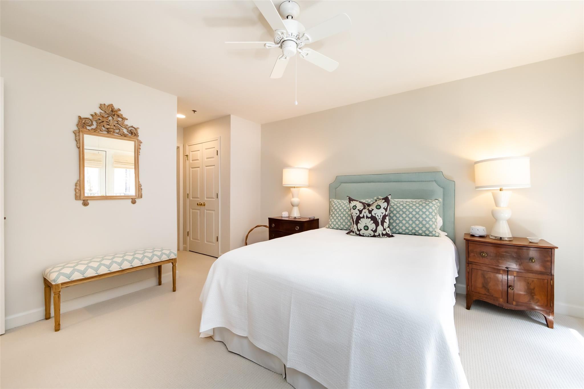 416 Queens Road, Unit 6 Charlotte, NC 28207 - Photo 25 of 37 a bedroom with a bed and a chandelier