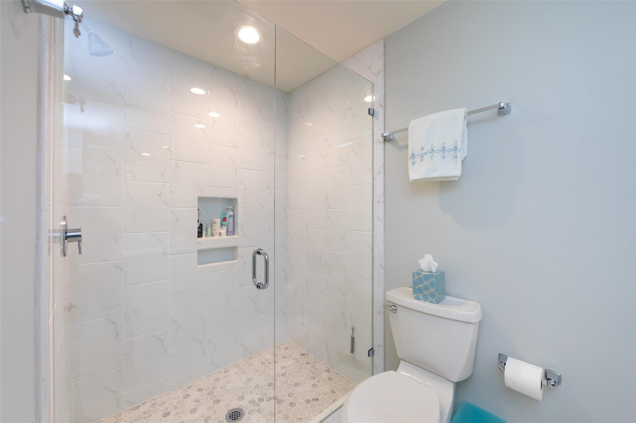 416 Queens Road, Unit 6 Charlotte, NC 28207 - Photo 31 of 37 a bathroom with a toilet shower and a sink