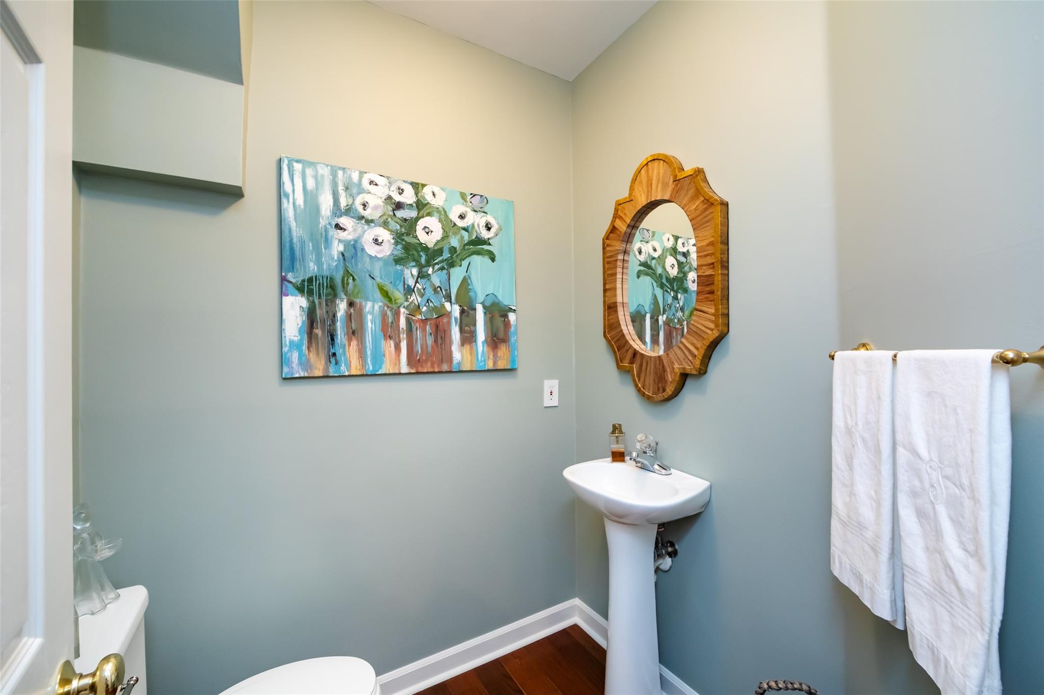416 Queens Road, Unit 6 Charlotte, NC 28207 - Photo 7 of 37 a bathroom with a sink a mirror and a toilet