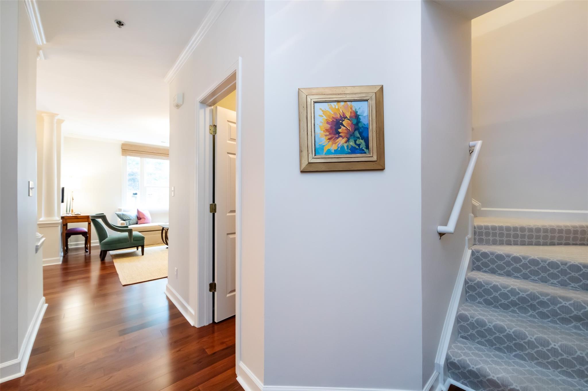 416 Queens Road, Unit 6 Charlotte, NC 28207 - Photo 9 of 37 a view of a hallway with wooden floor and furniture