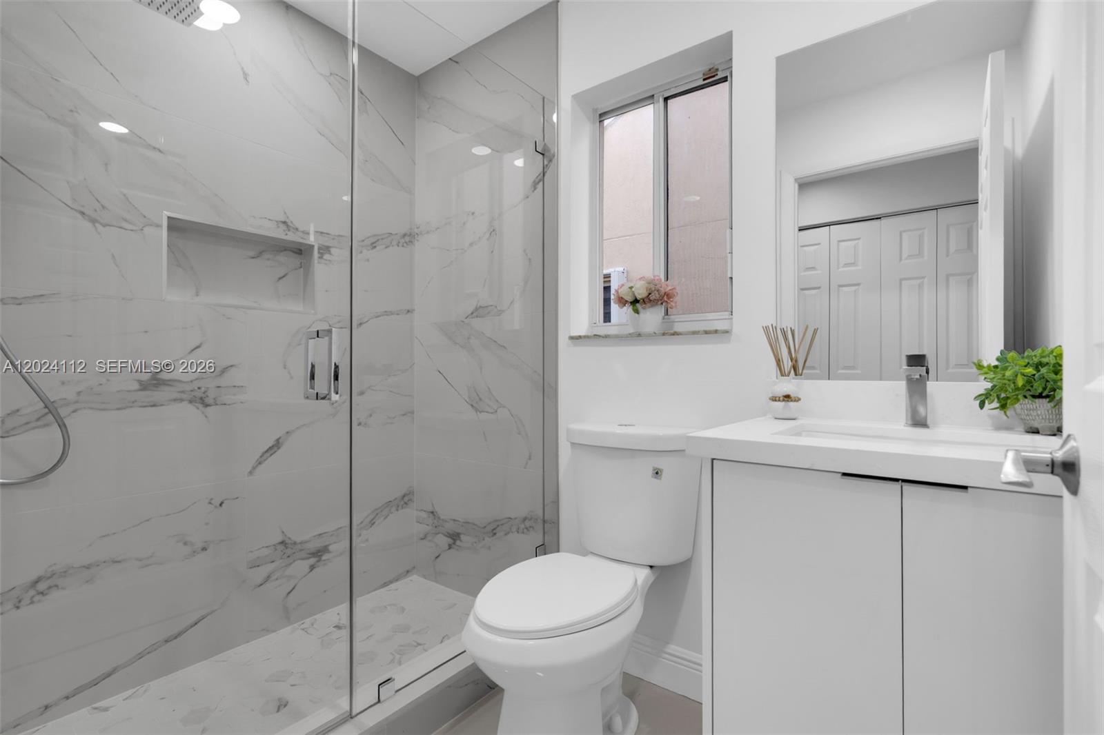 4366 Mahogany Ridge Drive Weston, FL 33331 - Photo 19 of 41 a bathroom with a sink toilet and shower