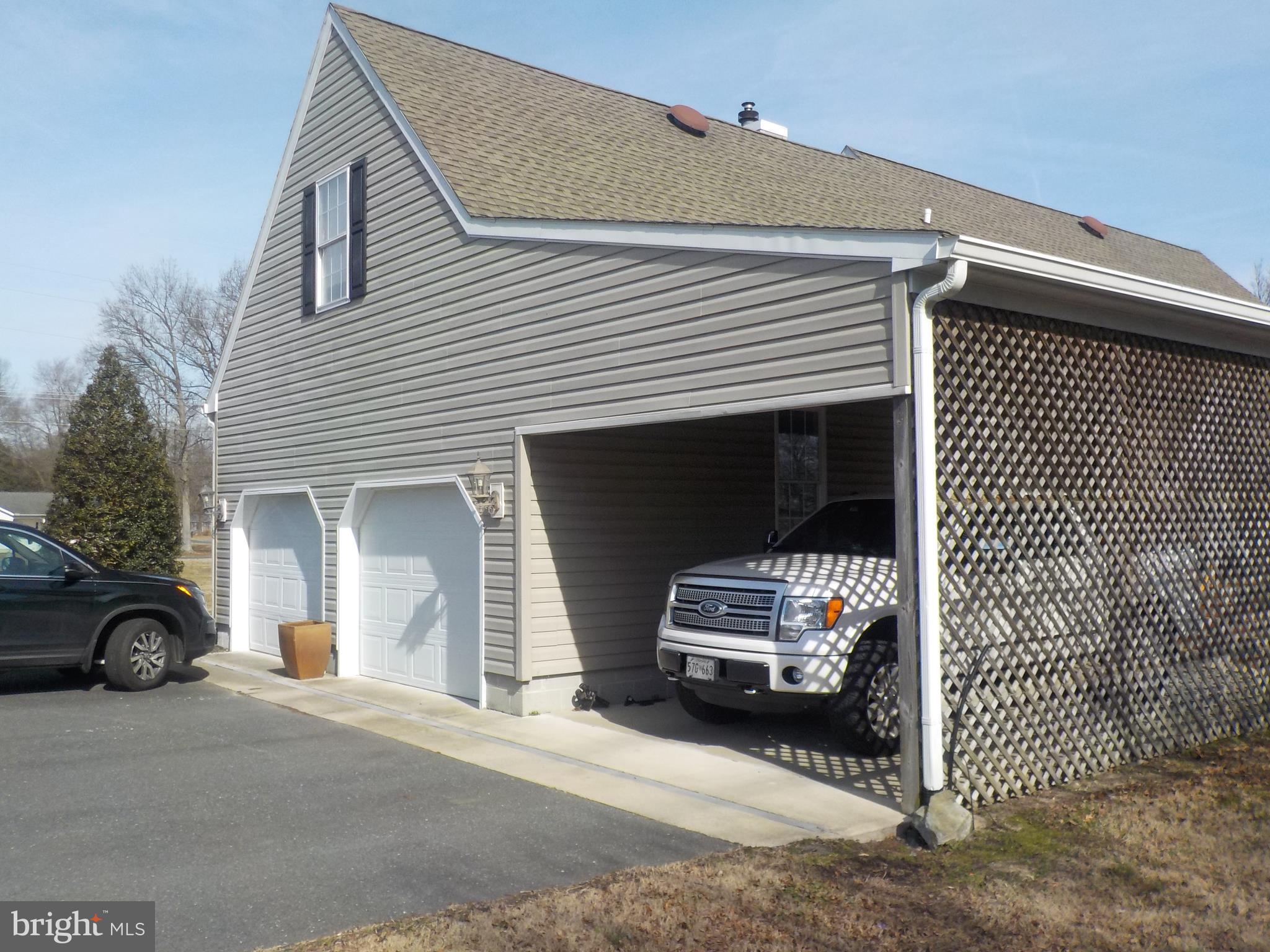 4181 Osborne Road Hurlock, MD 21643 - Photo 34 of 34 2 car garage with large carport