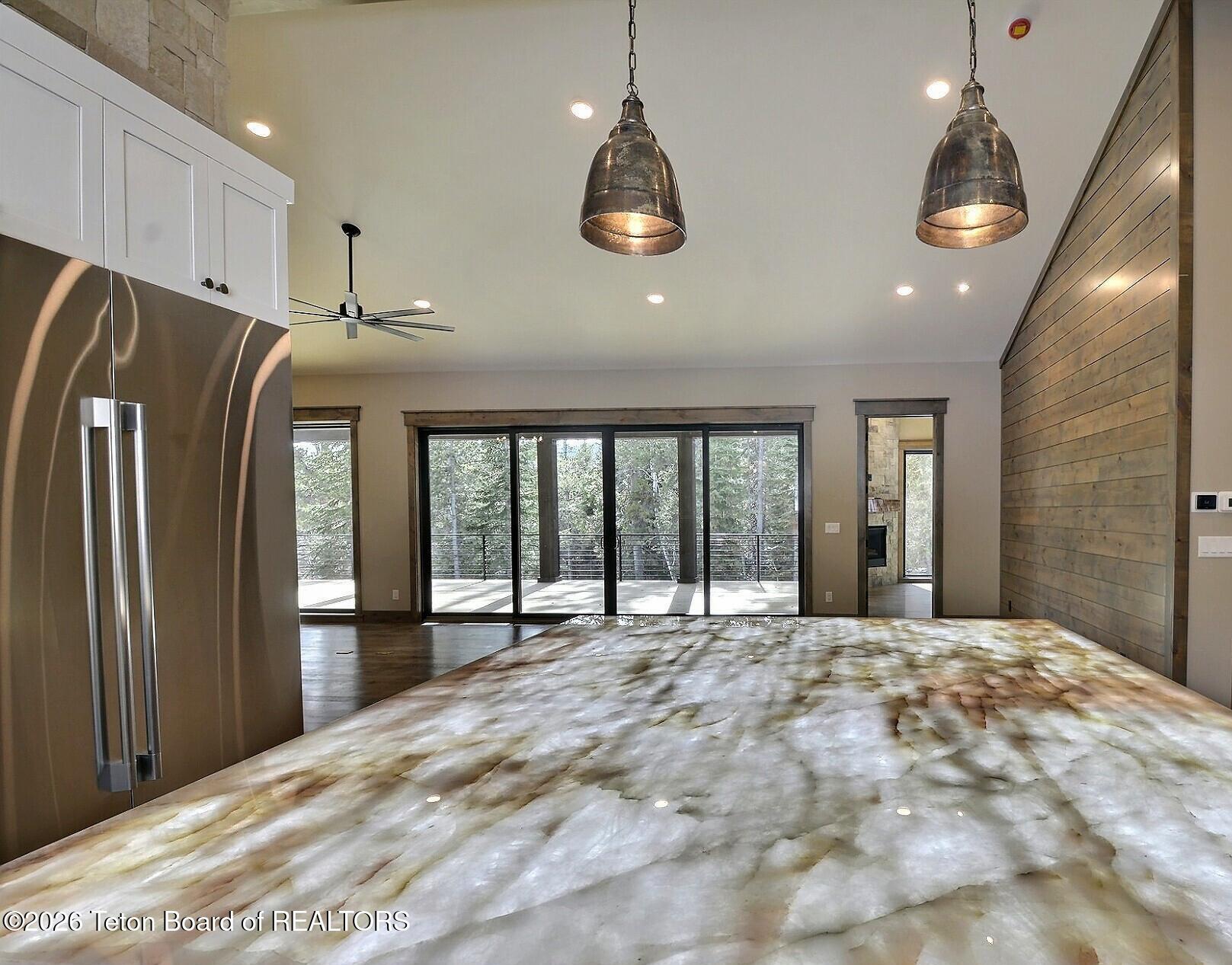 5727 Forest Ridge Road Victor, ID 83455 - Photo 30 of 76 Under-lighted Quartz Island