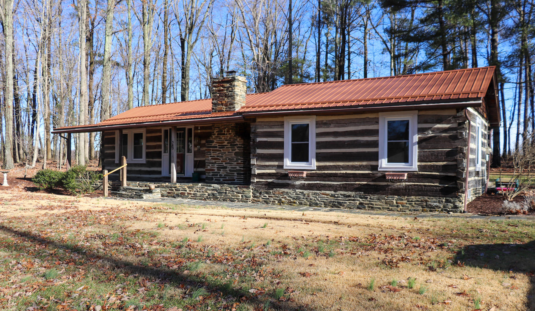 583 Alum Ridge Road Northwest Floyd, VA 24091 - Photo 1 of 22 a view of a house with a small yard and large tree
