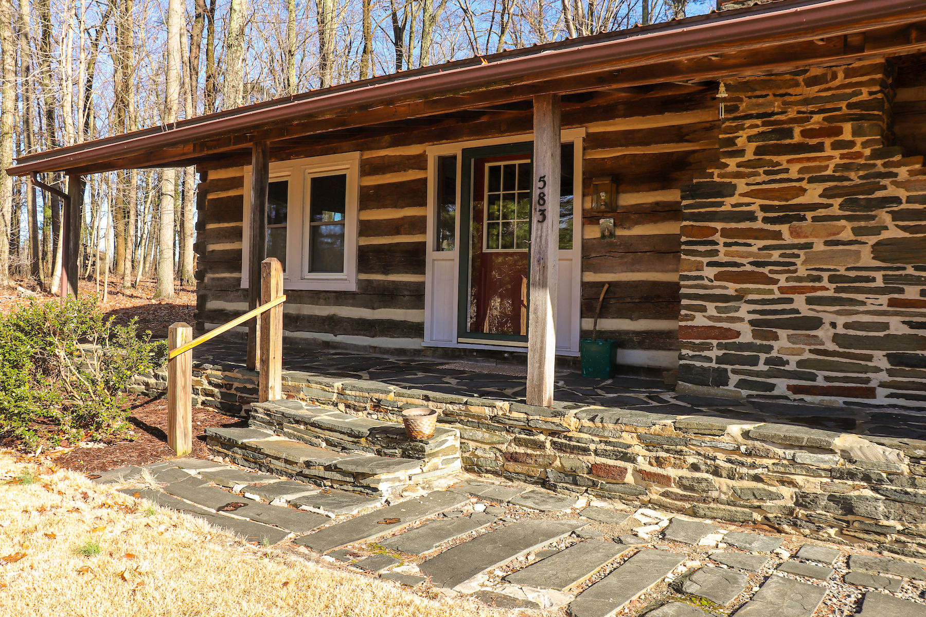 583 Alum Ridge Road Northwest Floyd, VA 24091 - Photo 2 of 22 a view of house with wooden door and chair
