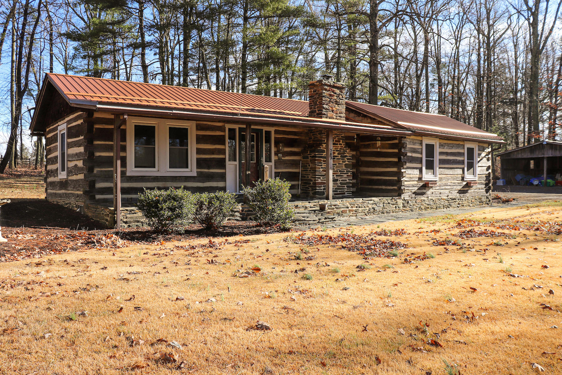 583 Alum Ridge Road Northwest Floyd, VA 24091 - Photo 20 of 22 a front view of house with yard covered in snow