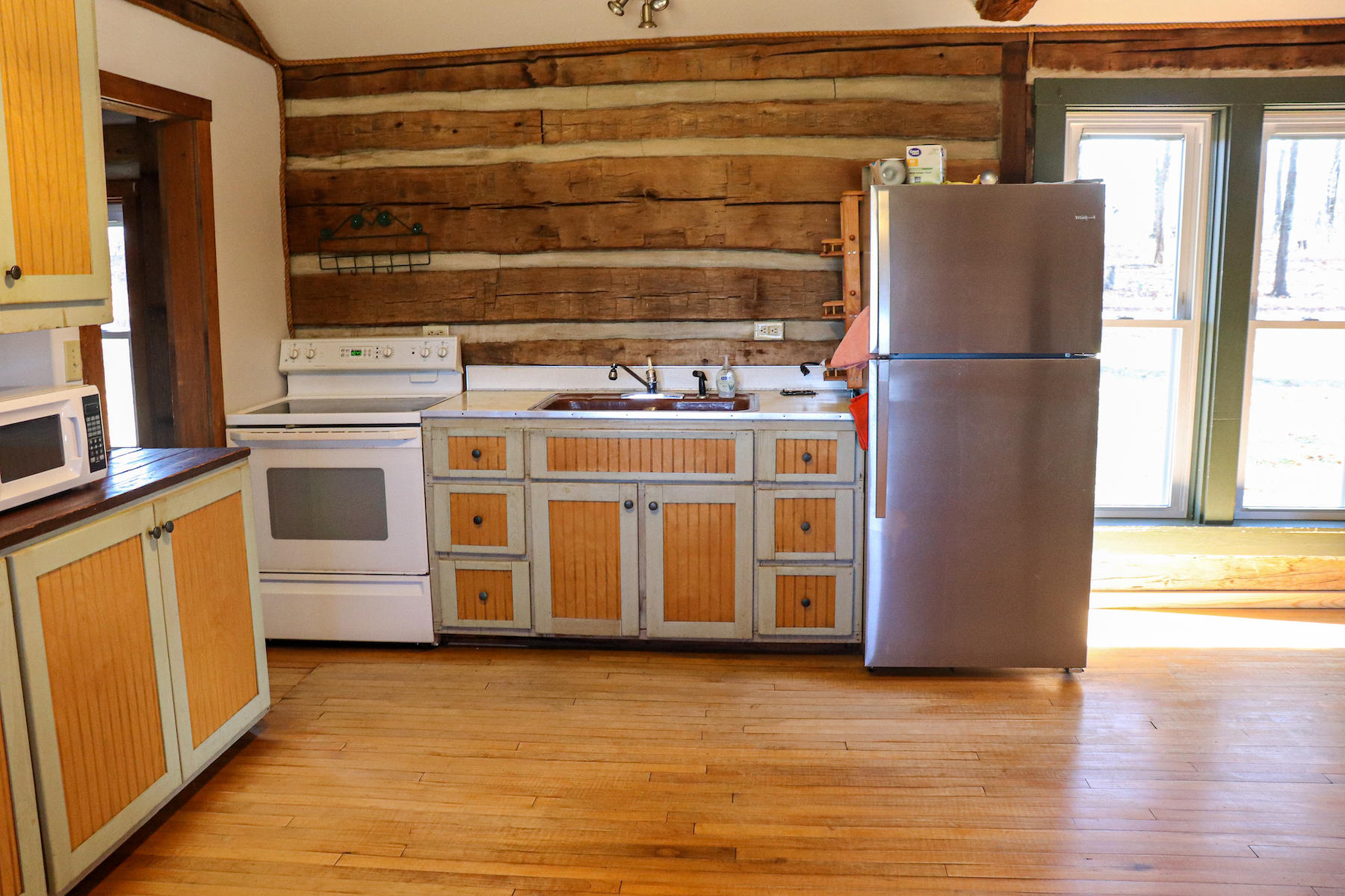 583 Alum Ridge Road Northwest Floyd, VA 24091 - Photo 3 of 22 a kitchen with stainless steel appliances granite countertop a stove and a refrigerator