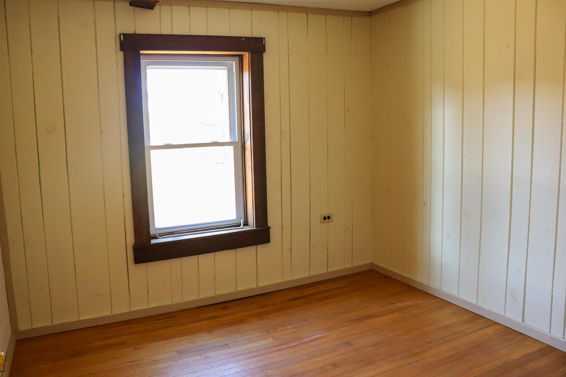 583 Alum Ridge Road Northwest Floyd, VA 24091 - Photo 8 of 22 a view of an empty room with wooden floor and a window