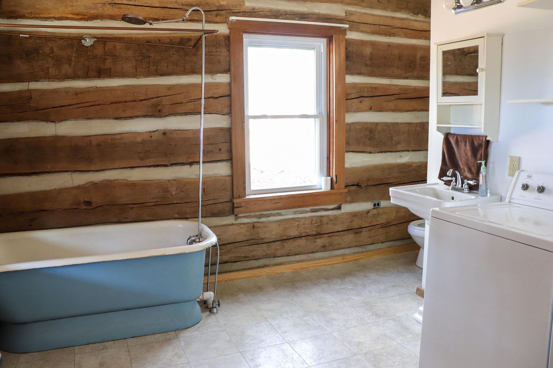 583 Alum Ridge Road Northwest Floyd, VA 24091 - Photo 10 of 22 a bathroom with a bathtub and a sink