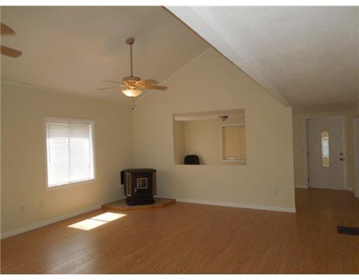 920 Kennebec Road Hampden, ME 04444 - Photo 16 of 25 Living Room. Pellet Stove for Added...