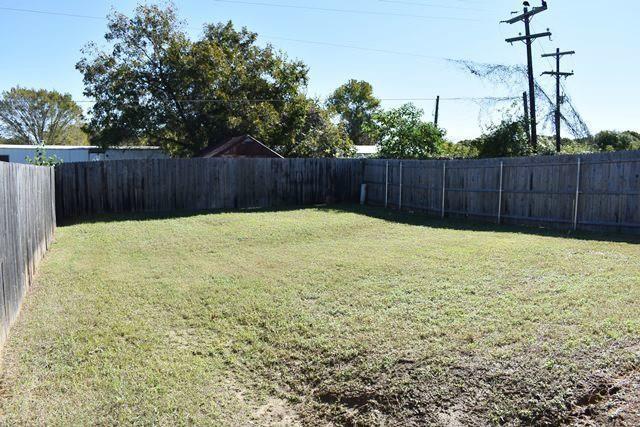 760-764 Stribling Circle Azle, TX 76020 - Photo 3 of 18 View of fenced backyard