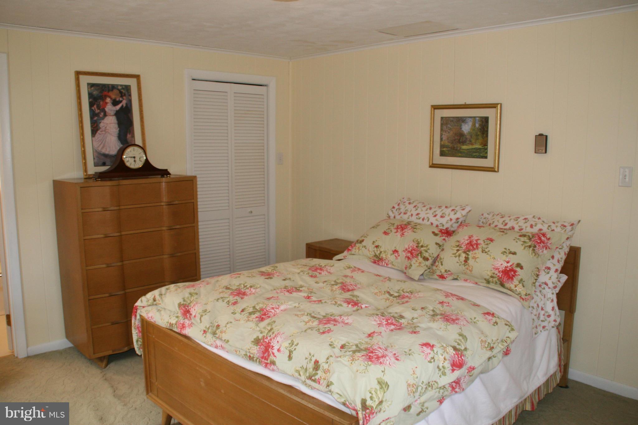 6606 Howellsville Road Front Royal, VA 22630 - Photo 15 of 30 a bedroom with a bed and a dresser