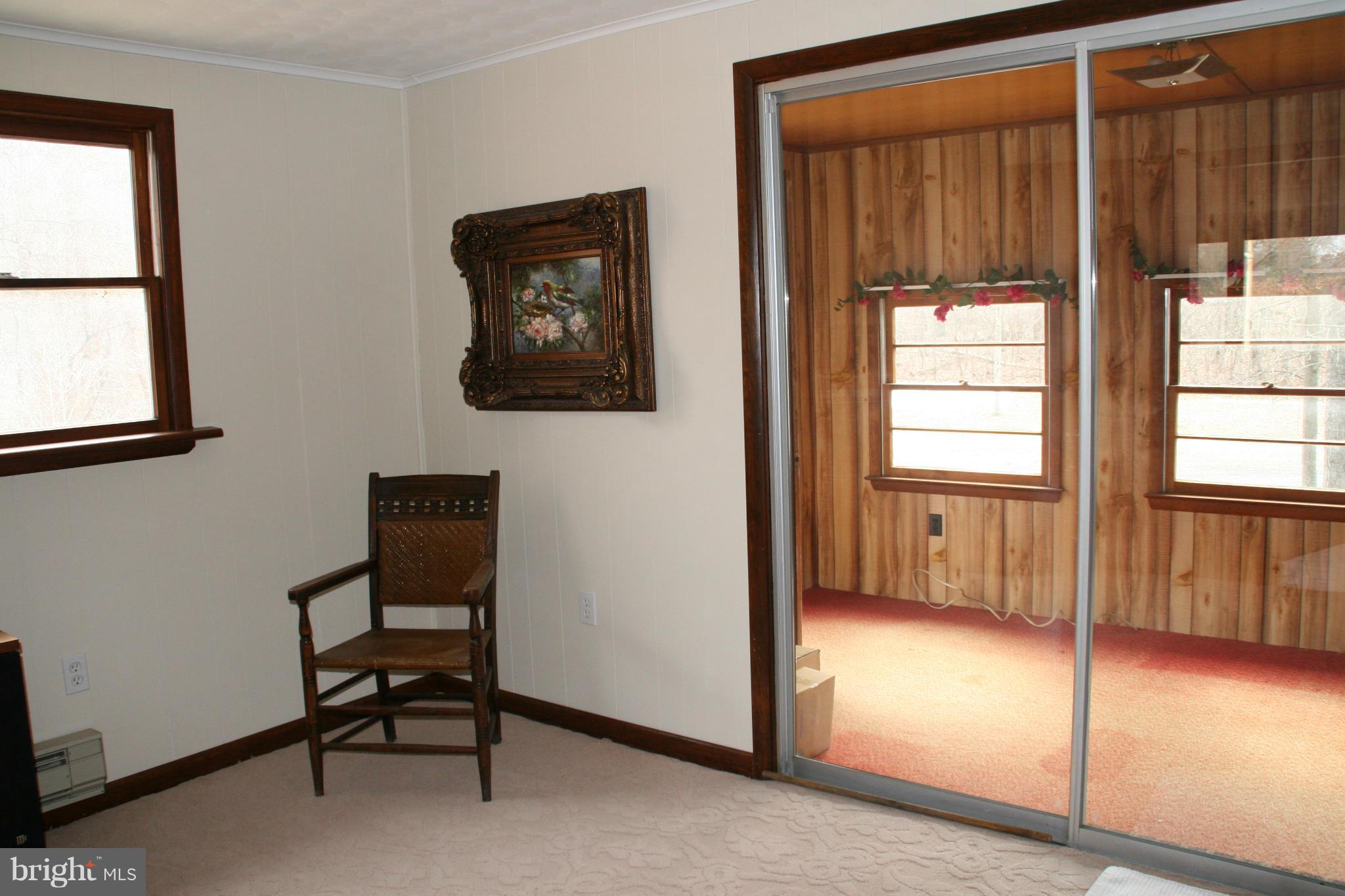 6606 Howellsville Road Front Royal, VA 22630 - Photo 25 of 30 a view of a hallway with windows and closet