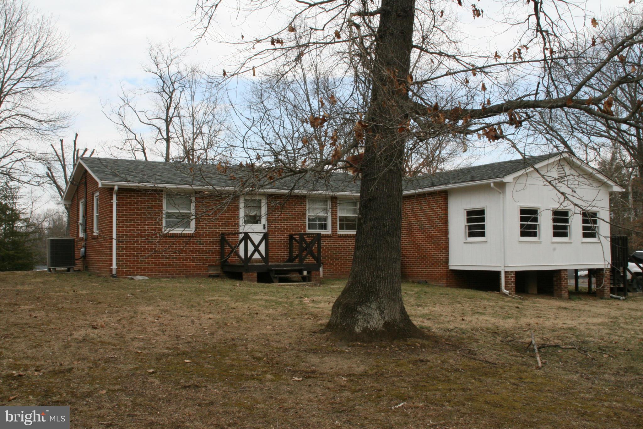 6606 Howellsville Road Front Royal, VA 22630 - Photo 27 of 30 a view of a house with a yard covered in snow