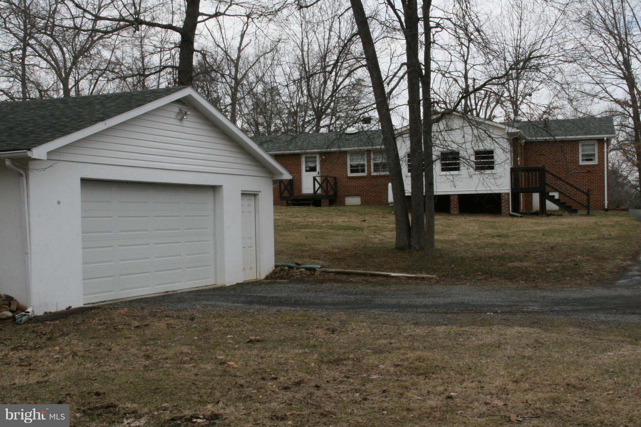 6606 Howellsville Road Front Royal, VA 22630 - Photo 28 of 30 a front view of a house with a yard