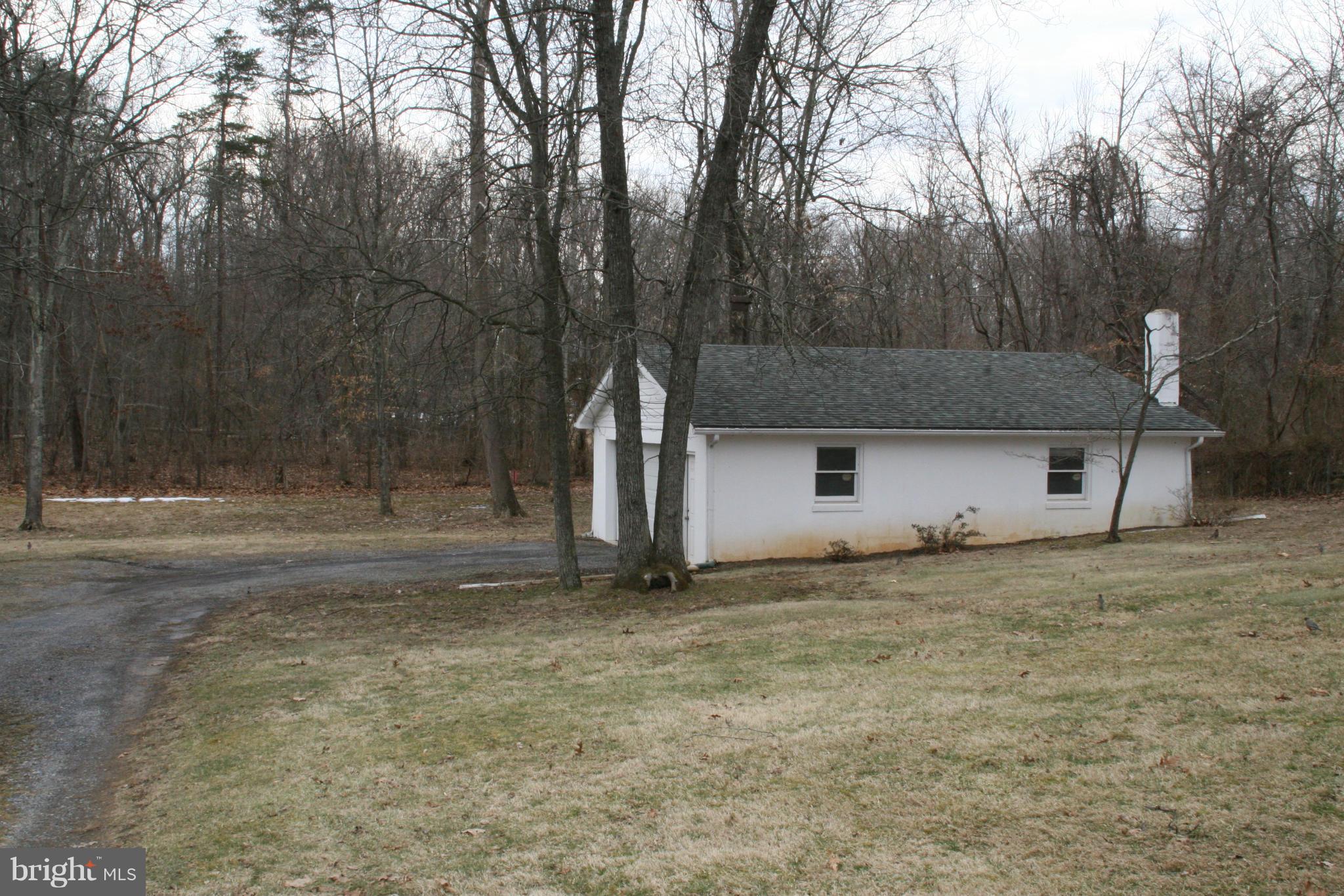 6606 Howellsville Road Front Royal, VA 22630 - Photo 29 of 30 a view of a house with a yard