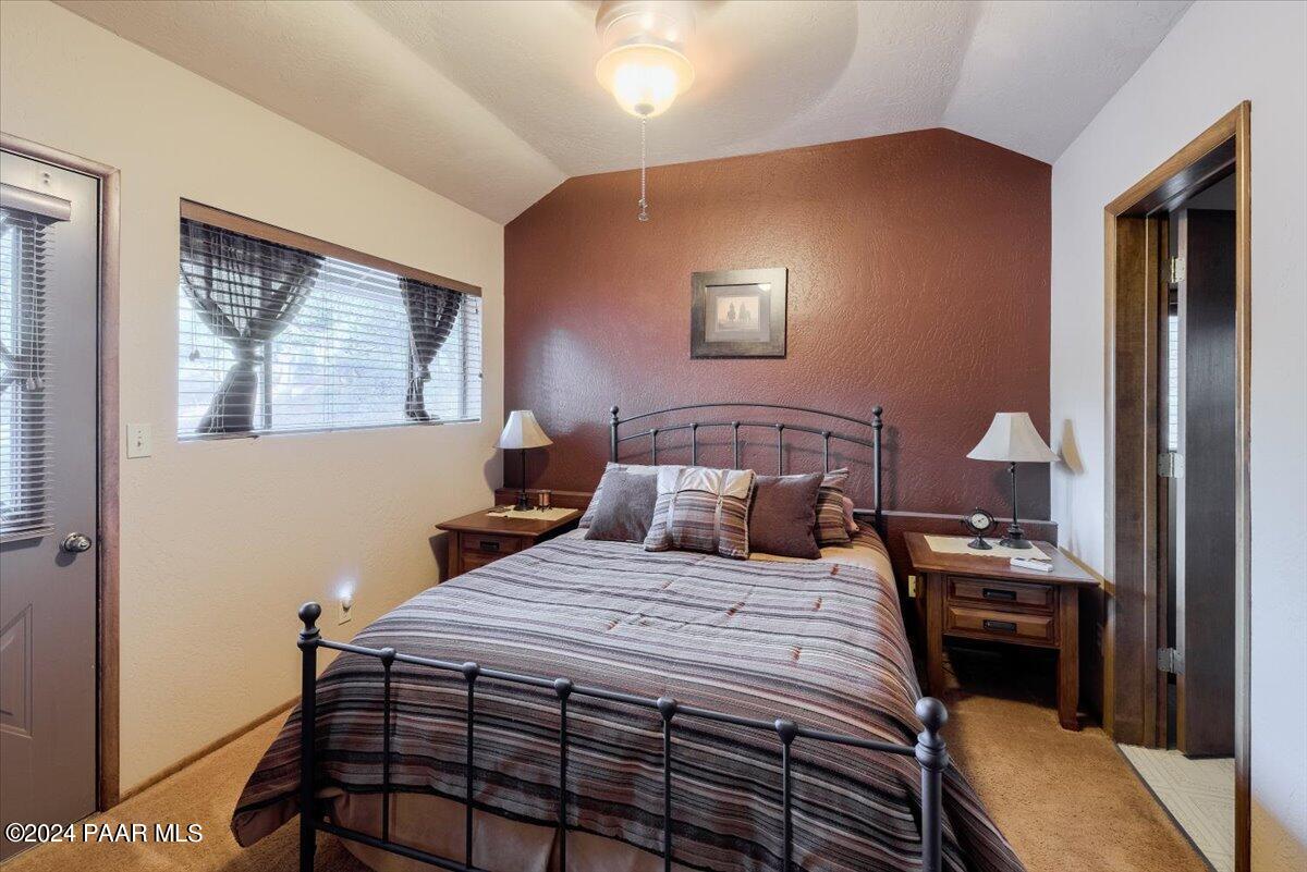 1804 Pyle Ranch Road Payson, AZ 85541 - Photo 108 of 113 a bedroom with a bed and a window