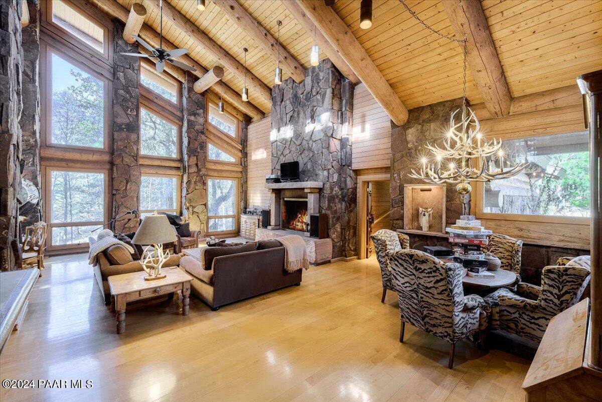 1804 Pyle Ranch Road Payson, AZ 85541 - Photo 38 of 113 a living room with furniture fireplace and a large window