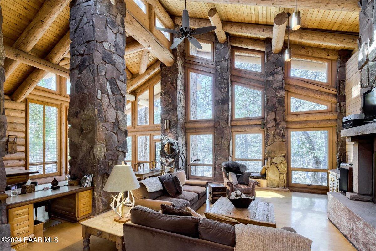 1804 Pyle Ranch Road Payson, AZ 85541 - Photo 41 of 113 a living room with furniture and floor to ceiling windows