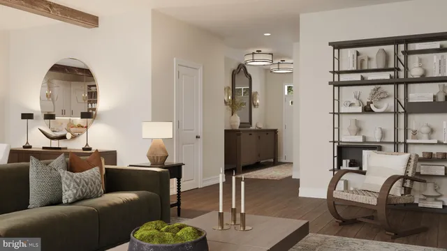 a living room with furniture a rug and a flat screen tv