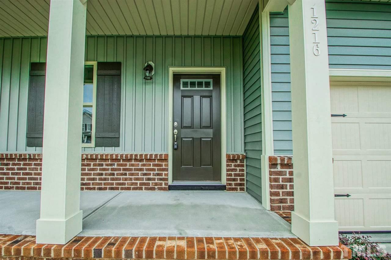1216 Silver Farm Road Raleigh, NC 27603 - Photo 2 of 25 a view of front door of house