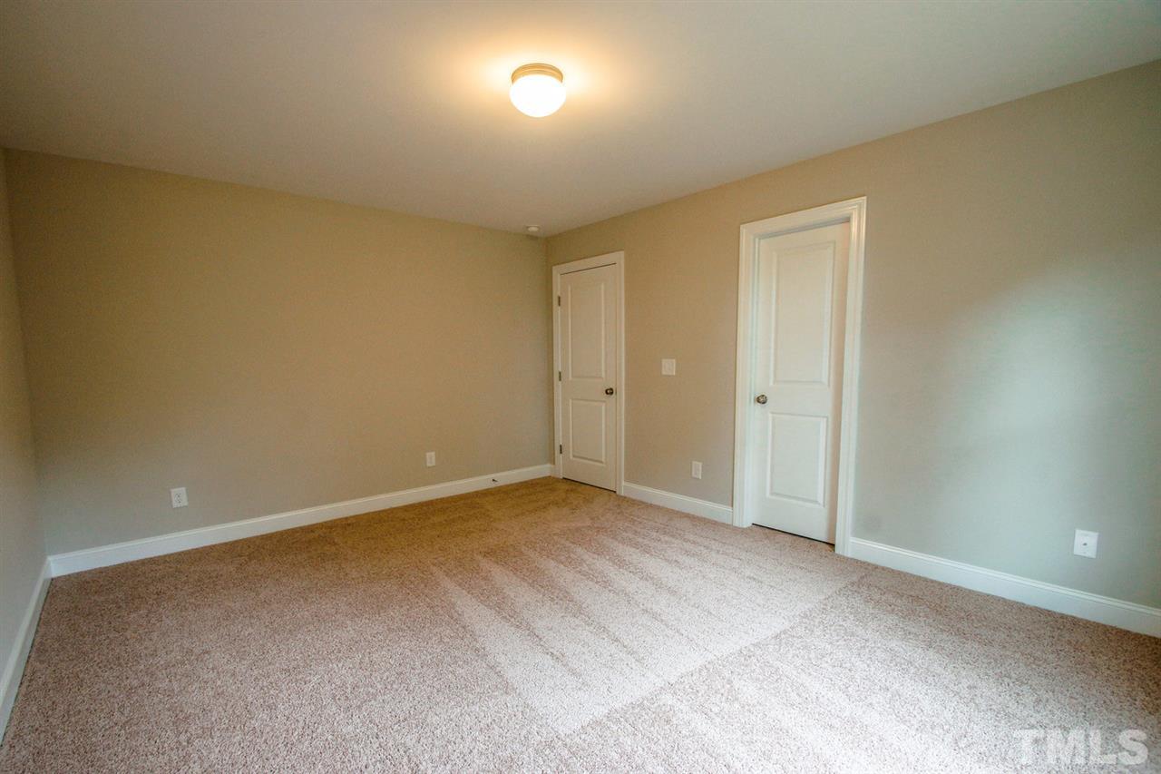 1216 Silver Farm Road Raleigh, NC 27603 - Photo 16 of 25 a view of an empty room