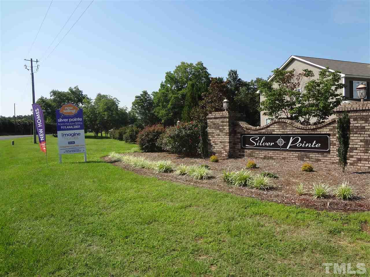 1216 Silver Farm Road Raleigh, NC 27603 - Photo 25 of 25 a view of a sign board with garden
